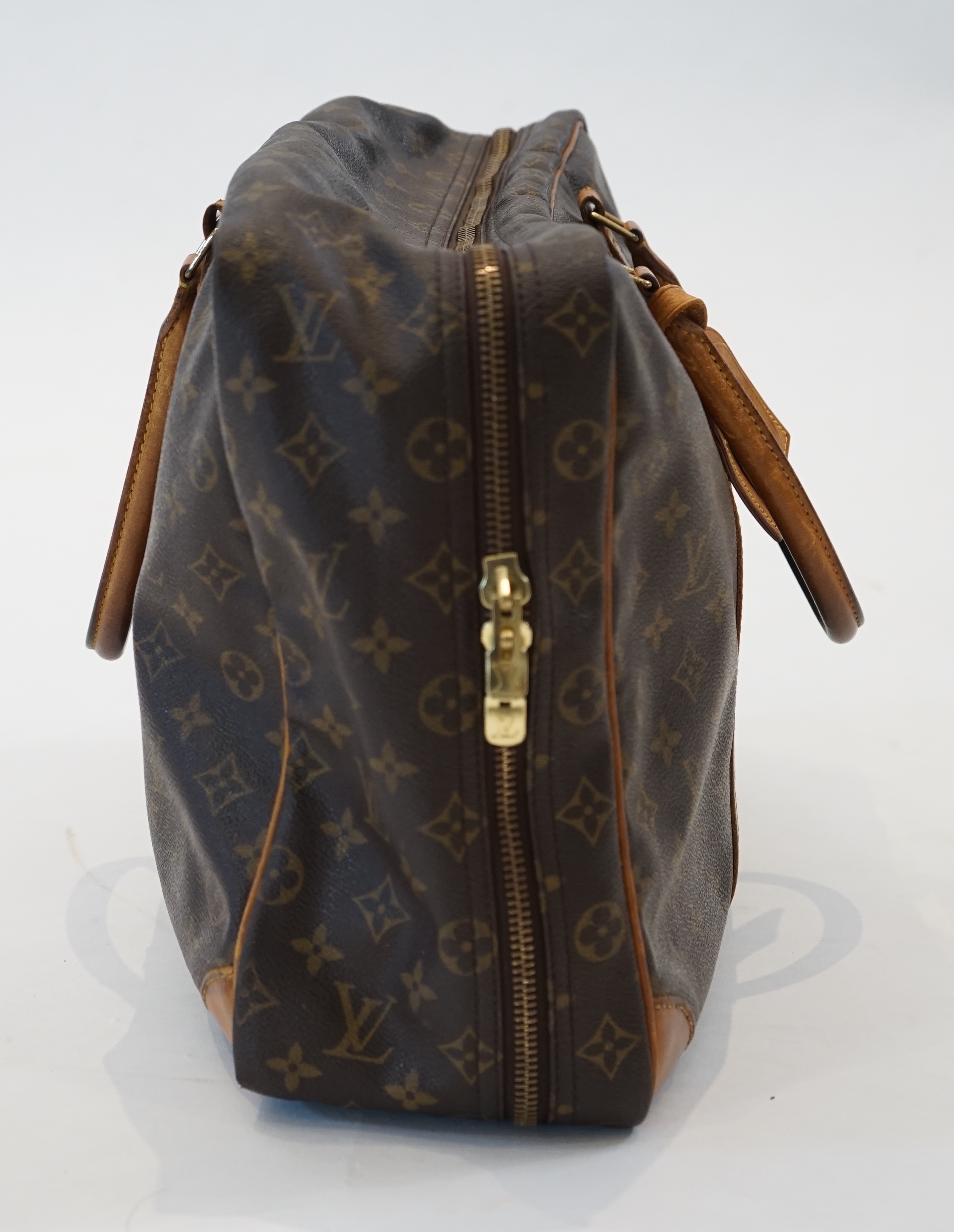 A Louis Vuitton Keepall leather travel bag with luggage tag width 13cm, length 45cm, height 30cm